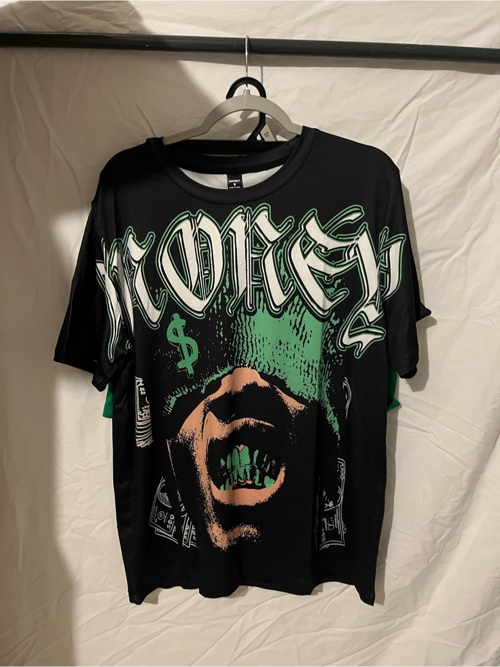 Graphic Black Short-Sleeve Tee with Green and Peach Money Motif